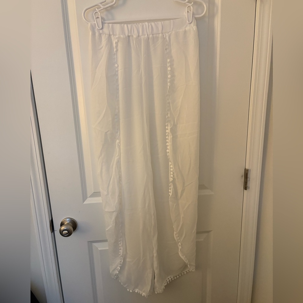 Sheer pants with open slit